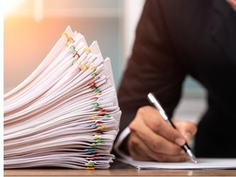 Pile of papers on a desk